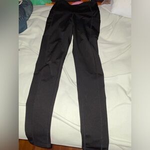 small unworn black silk leggings with pockets